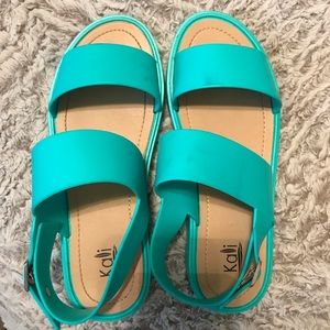 Aqua plastic sandals